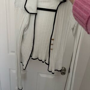 Elegant White Sweater with Black Trim